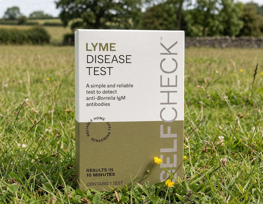 Lyme disease self-test kit in a grassy field