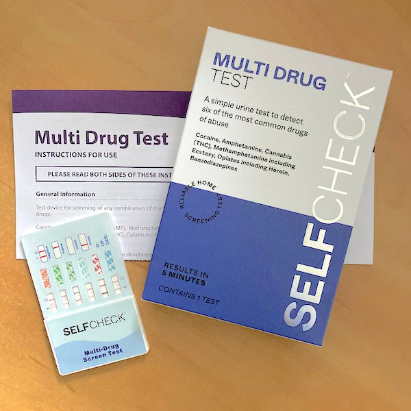 SELFCHECK Multi Drug Test components on a desk