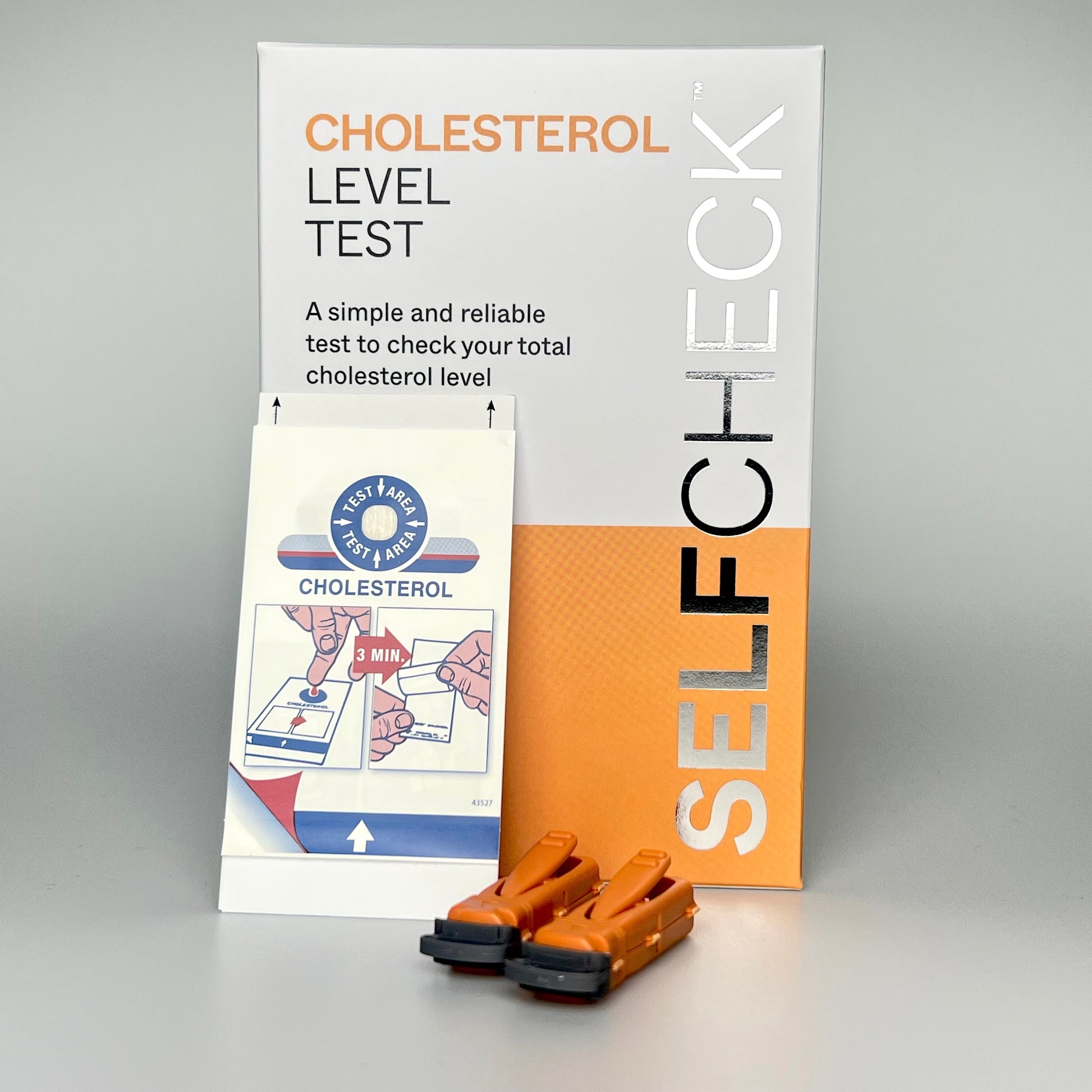 SELFCHECK Cholesterol Test Kit Box, test device and two lancets.