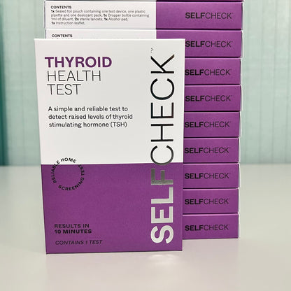 Stack of SELFCHECK Thyroid Health Tests from assembly line