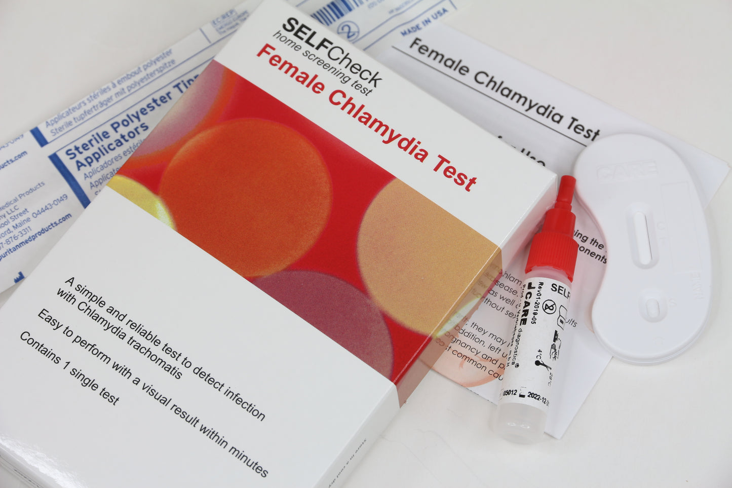 SELFCheck female chlamydia test kit box and components