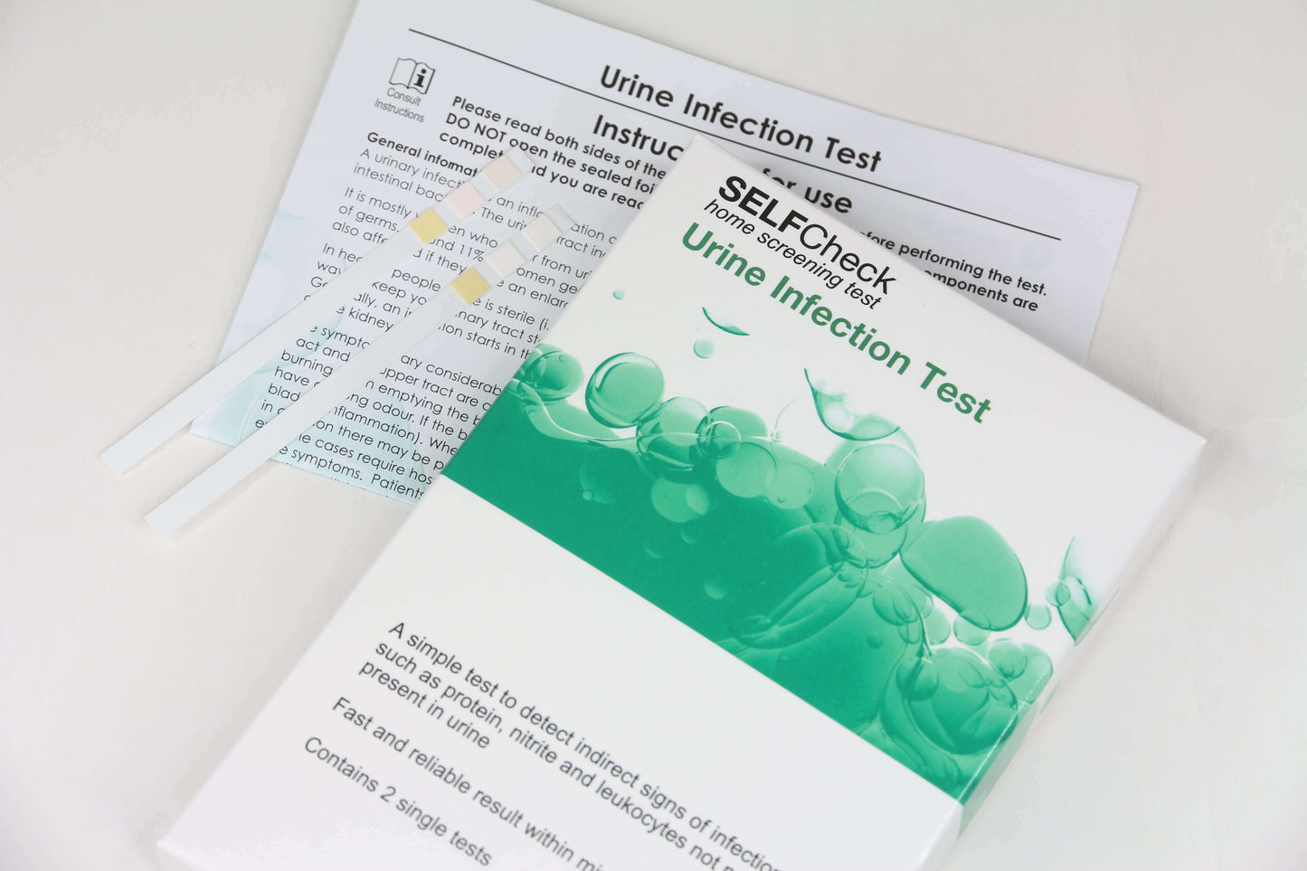 SELFCheck urine infection test kit showing test strips and box